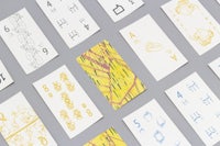 a collection of playing cards with different designs on them